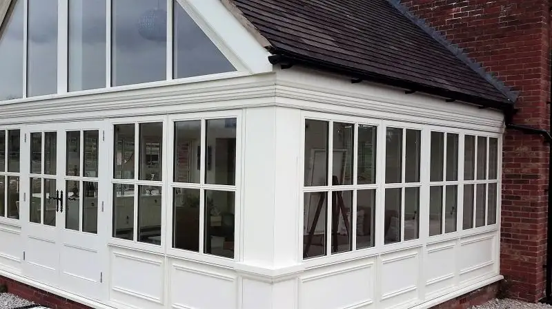 Painted summer room with French doors on a multi-point lock with high performance windows: Swipe To View More Images